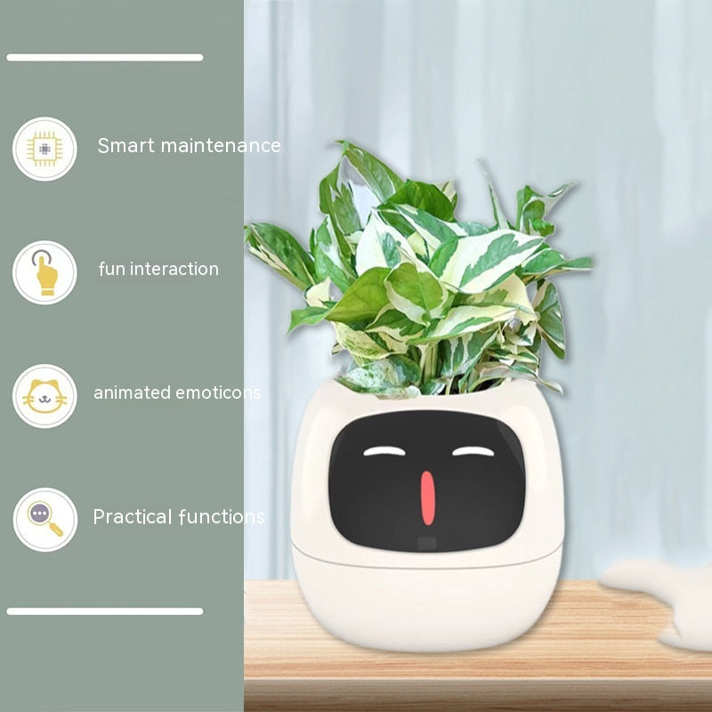 White IVY smart planter displayed with a leafy plant